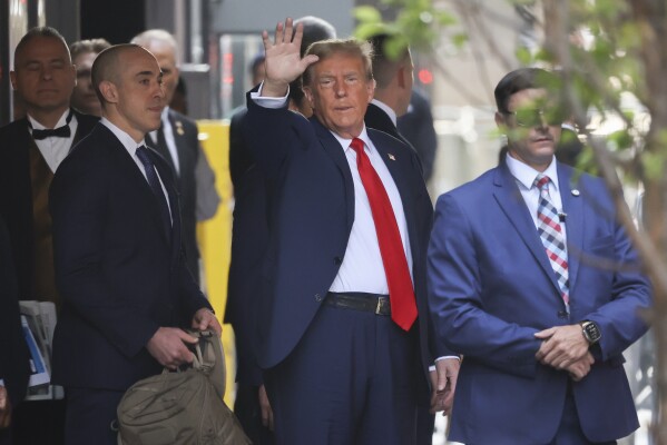 Former President Donald Trump leaves Trump Tower on his way to Manhattan criminal court, Monday, April 15, 2024, in New York. (AP Photo/Yuki Iwamura)